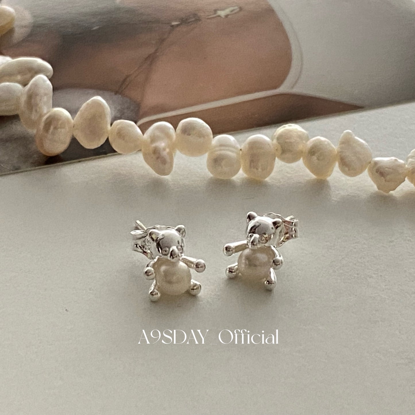 925 Mini Bear Hugging Pearl Earring - E006