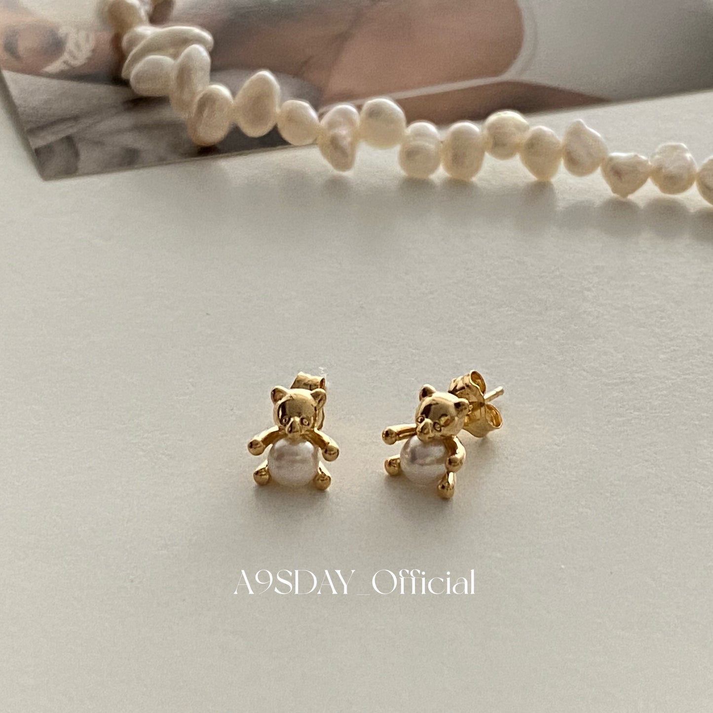 925 Mini Bear Hugging Pearl Earring - E006