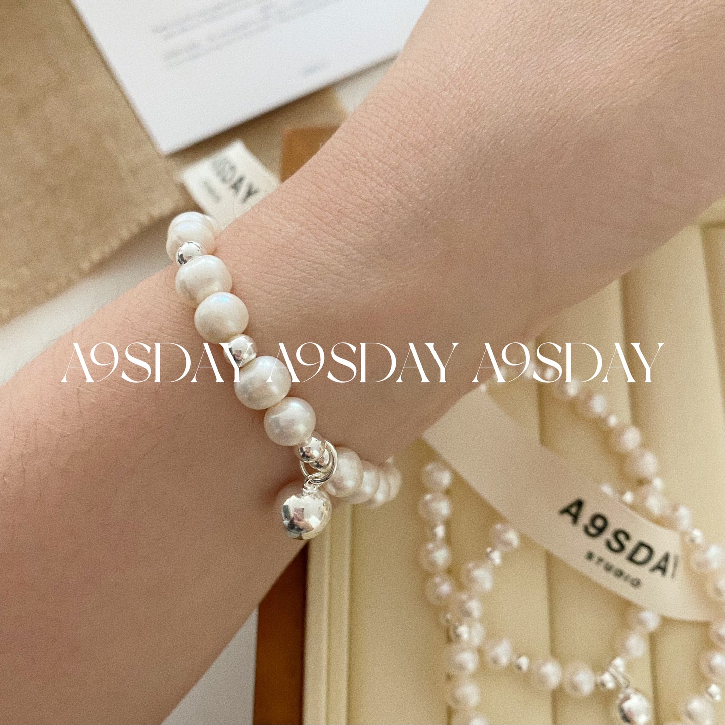 925 Silver Ball Elastic Pearl Bracelet - B004